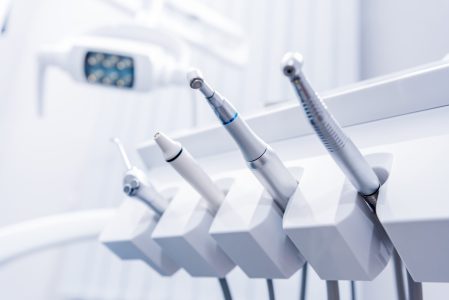 selective focus of various dental drills in dentist office
